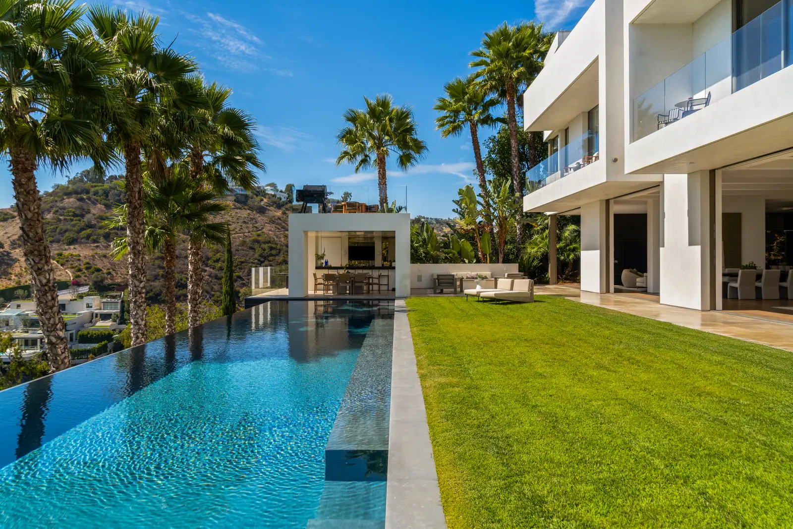 Pool with palms and the canyon opening to the west