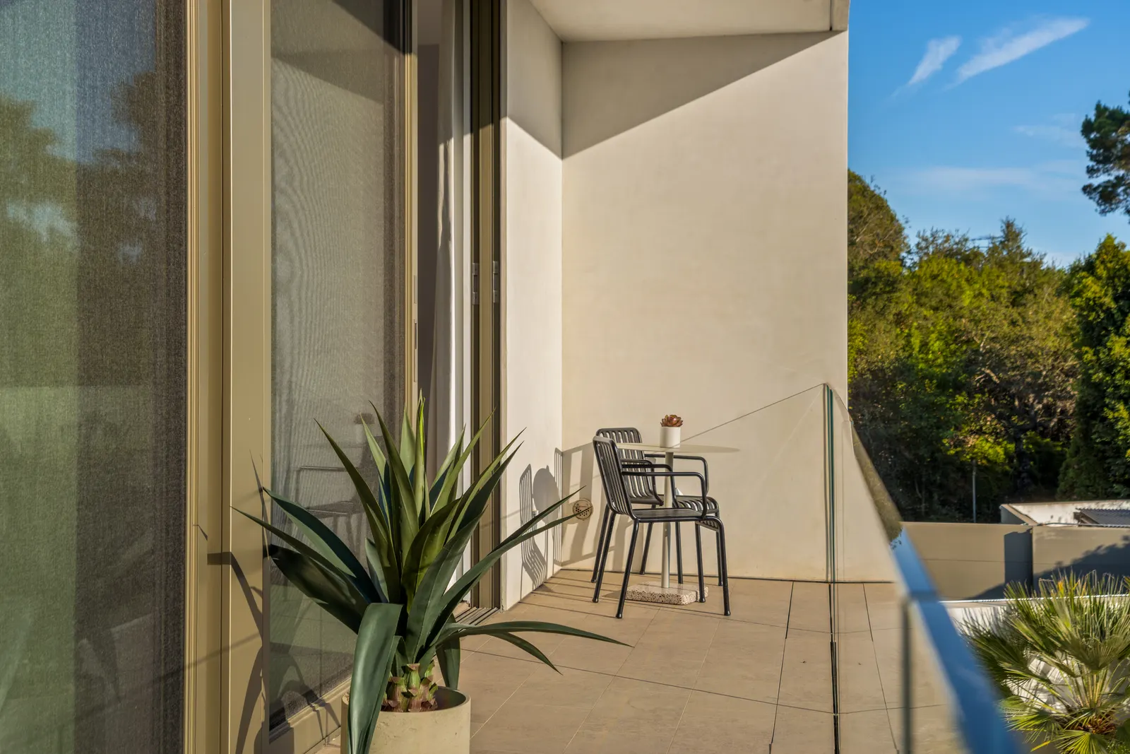Balcony with planted edge looking across the hillside